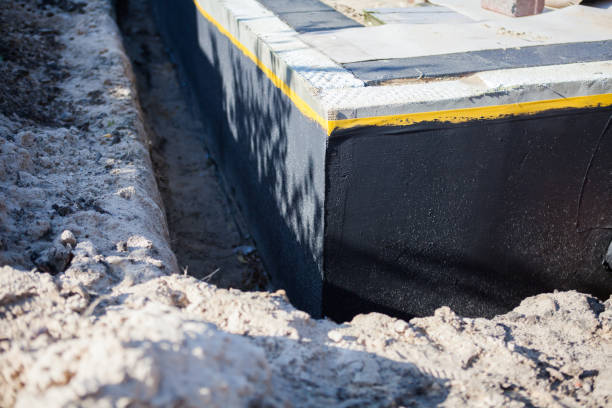 Professional Waterproofing technician working in Cookeville, TN